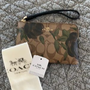Authentic Coach Signature khaki and rose Wristlet